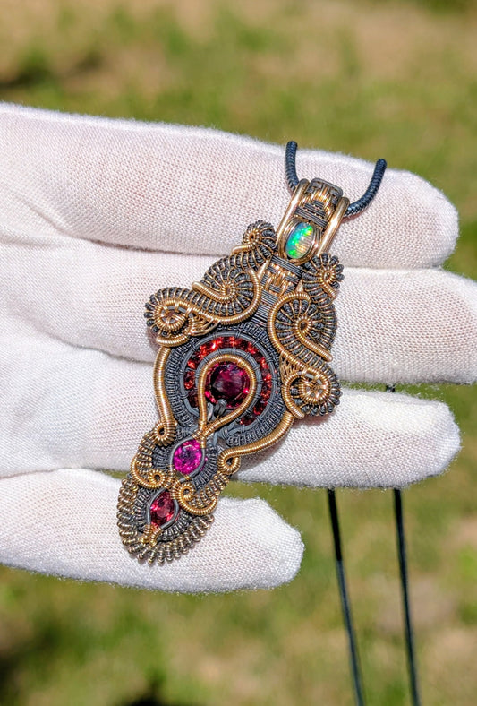 Twisted Up Wraps Collaboration - “Lyra” Garnet & Opal Pendant
